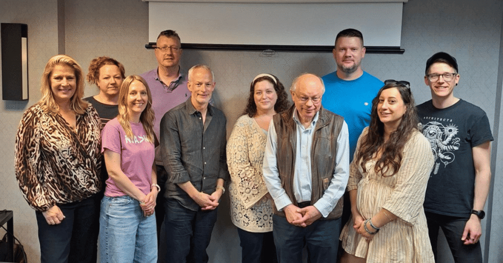 The Boston NKH Crusaders Research Conference 2026 families stood with Professor Nick Greene from UCL