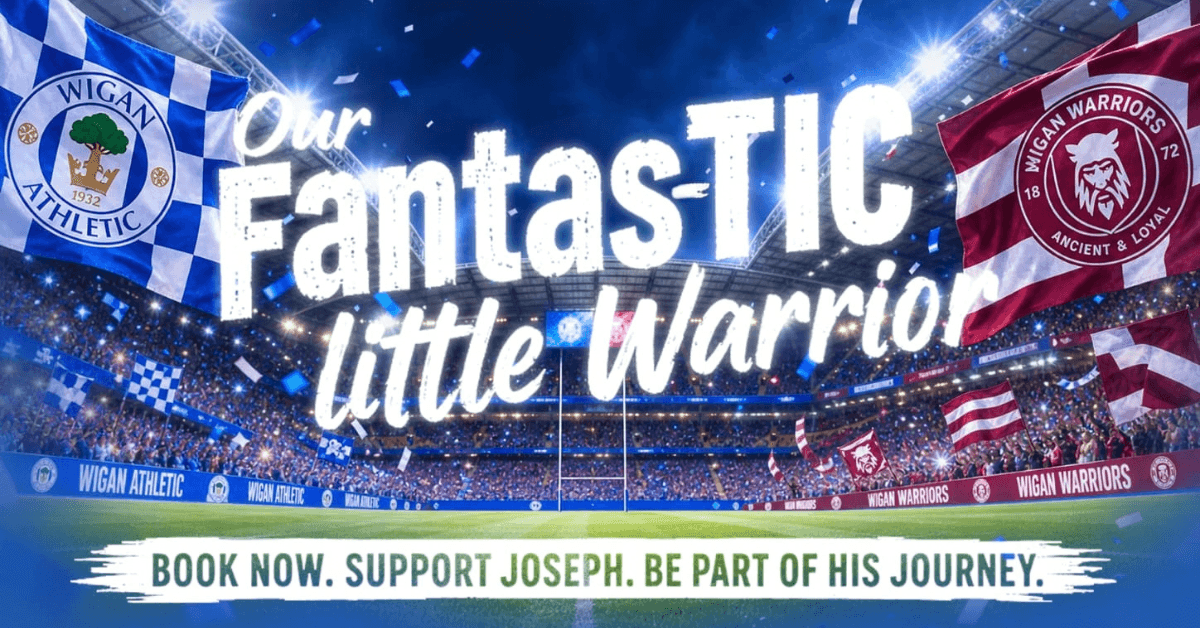 A promotional graphic shows a packed stadium decorated with blue and red flags representing Wigan Athletic and Wigan Warriors. Large white text reads “Our FantasTIC Little Warrior,” with smaller text at the bottom saying, “BOOK NOW. SUPPORT JOSEPH. BE PART OF HIS JOURNEY.” Confetti falls over the stadium pitch.